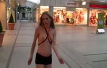 German chick topless and walking around with a cum facial